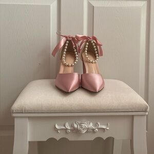 Pink satin pearl pumps